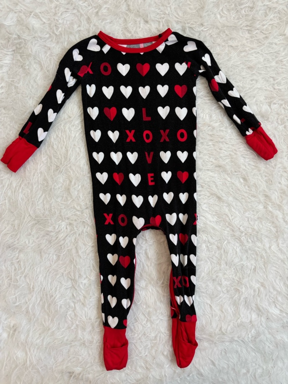 Little Sleepies Gender Neutral Black Footed Zippy with Festive Hearts AOP